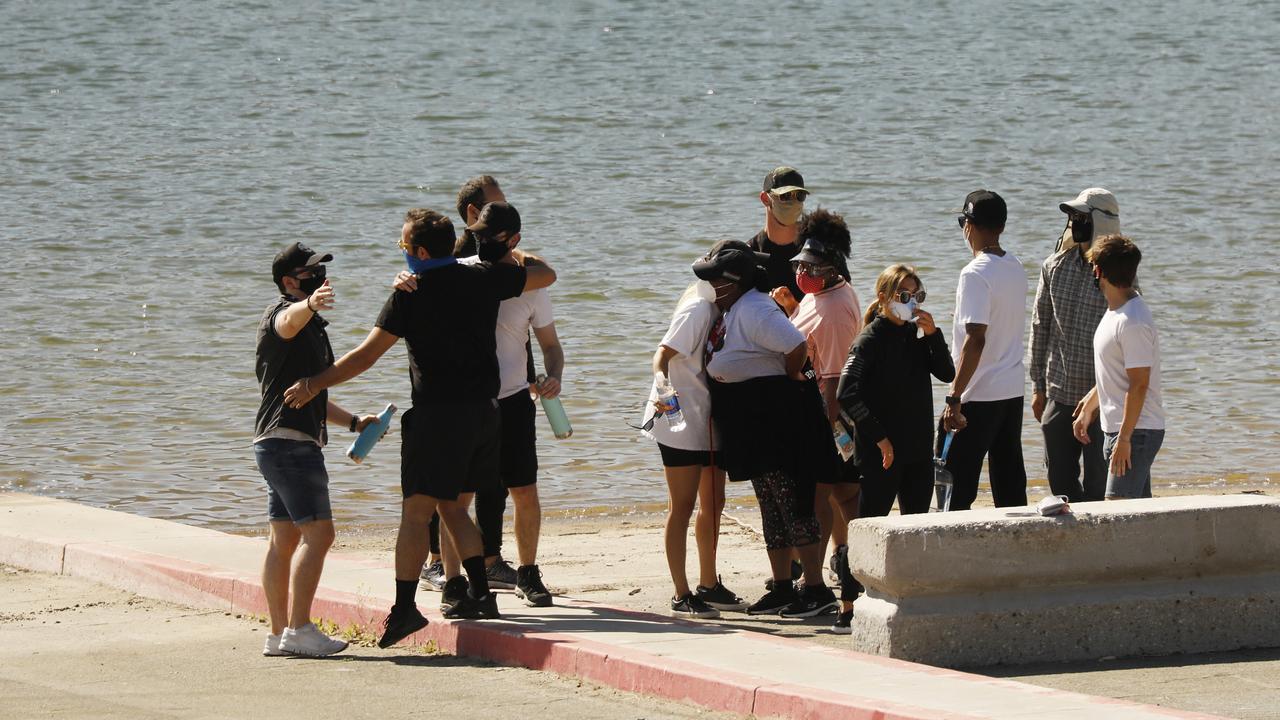 Cast members from the TV Show Glee and friends at Lake Piru where Naya’s body was found. Picture: Al Seib/Los Angeles Times via Getty Images