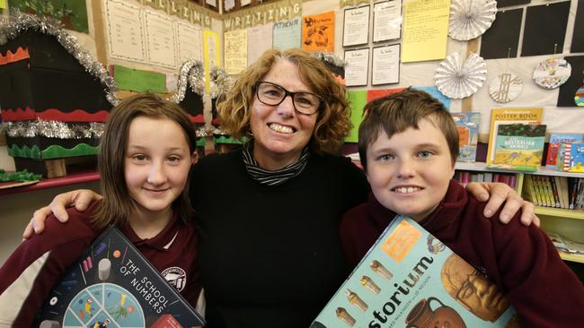 Goodwood Primary School principal Louise Anders with students, Amala Webb, 11, and Jackson Dunning, 12. The school was the best improvers for NAPLAN results for year 5 over the past 5 years. Photo: ROGER LOVELL