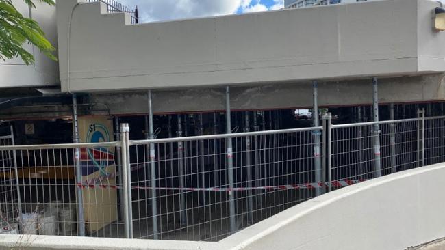 Fencing showing repair works underway on one level of the Bruce Bishop car park in Surfers Paradise.