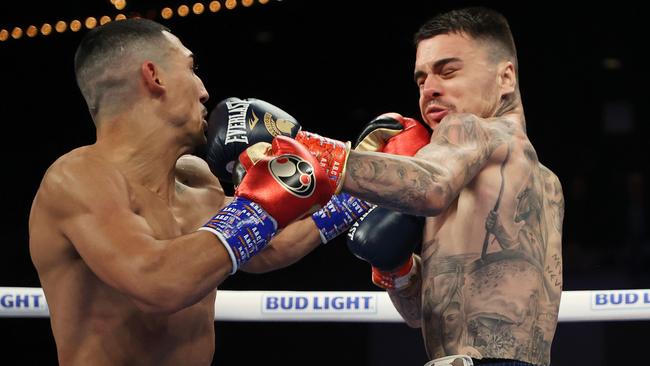 George Kombosos (right) scored a stunning upset against Teofimo Lopez last month. Picture: Al Bello/Getty Images