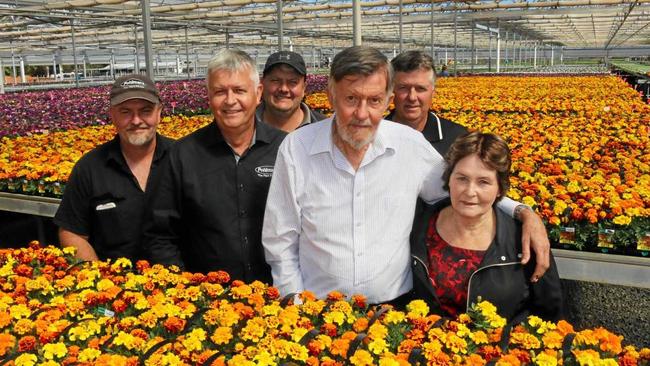 VALE: Val Pohlman (right) with sons John Jnr, Robert, Greg and Mark and John Snr at Pohlmans Nursery. Her family sadly announced Val passed away yesterday. Picture: Tom Threadingham