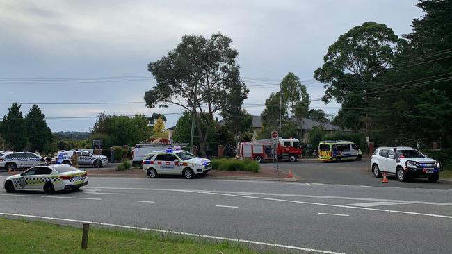 Police evacuate the nursing home.