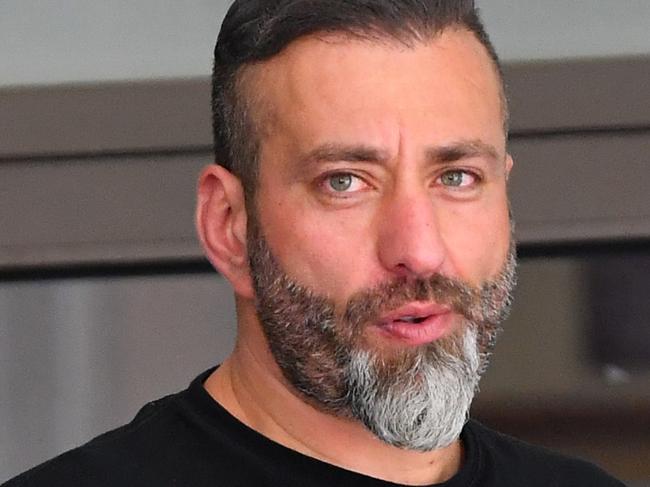 Fadi Haddara (left) and Waleed Haddara depart the Melbourne Magistrates Court in Melbourne, Wednesday, January 15, 2020. Compulsory examinations are taking place for a dozen witnesses in relation to a fatal shooting at the Melbourne Pavillion during a boxing match last year. (AAP Image) NO ARCHIVING