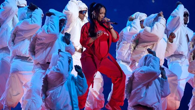 Barbadian singer Rihanna performs during the halftime show of Super Bowl LVII between the Kansas City Chiefs and the Philadelphia Eagles. (Photo by TIMOTHY A. CLARY / AFP)