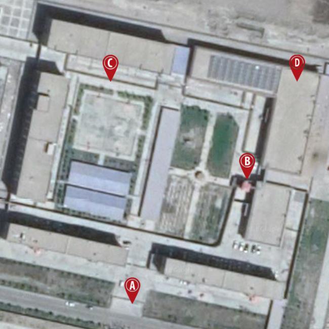 The ‘vocational training’ facility allegedly being used to detain and 're-educate' Muslim Uighurs. A) The guarded gate. B) The red-roofed watch tower. C) Part of the tall concrete-and-wire wall D) Dormitories. Picture: Google Earth