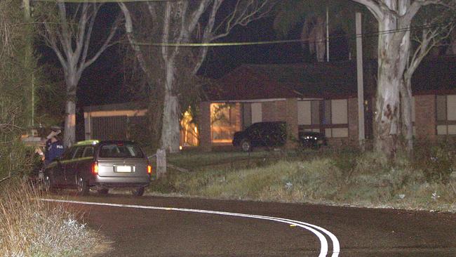 The scene in the early hours of the morning after Jim Skouloudis’s execution-style murder at his Kemps Creek home in 2003. Picture: Bill Hearne