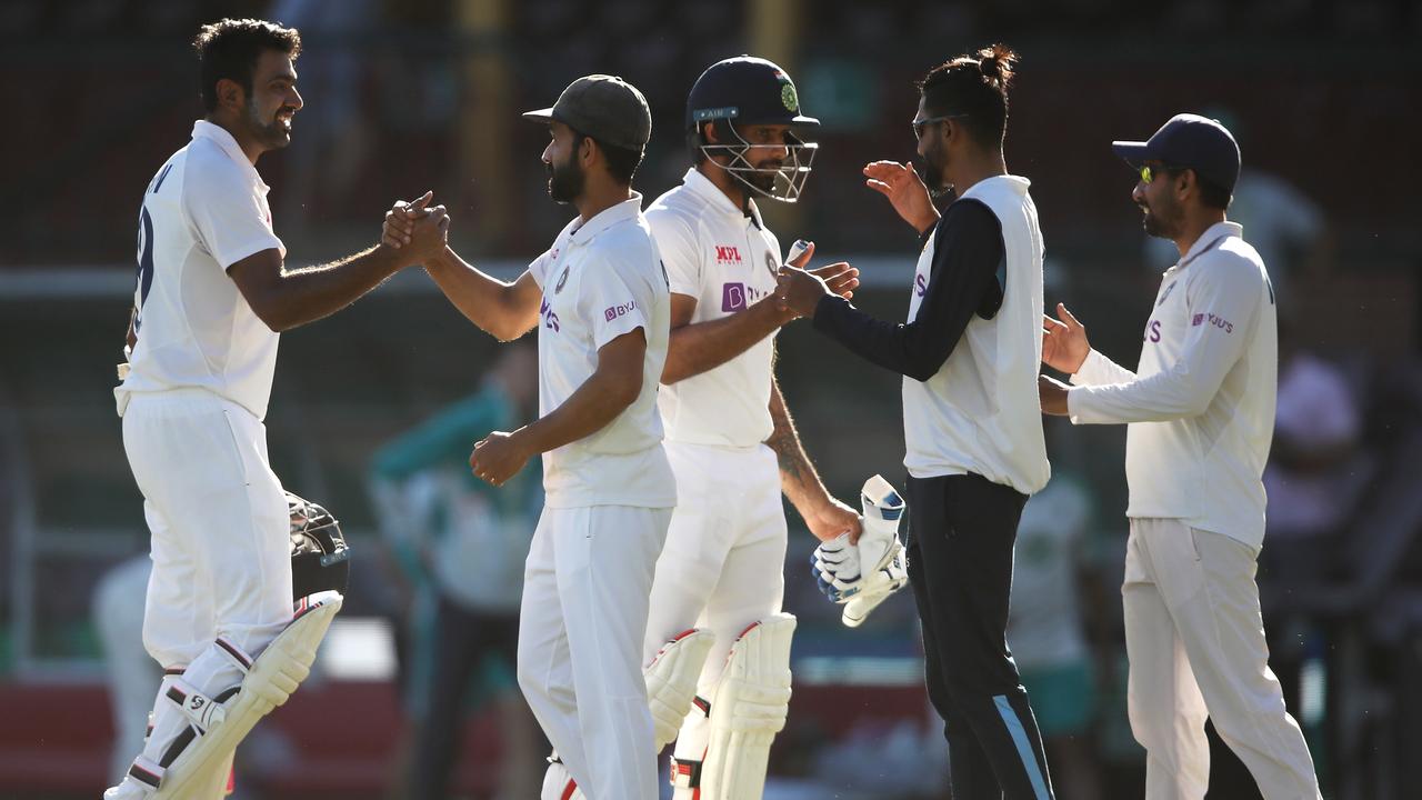 India celebrate securing a draw. (Photo by Mark Kolbe/Getty Images)