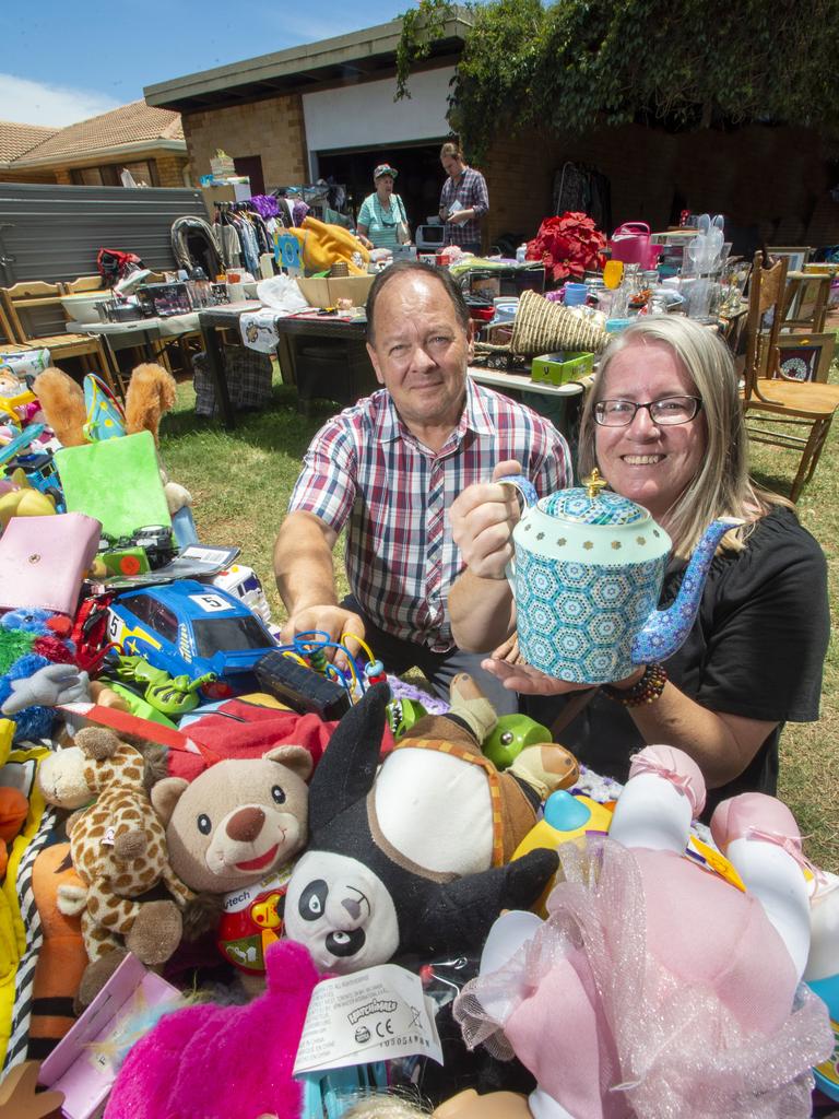 Tony's Kitchen volunteers (from left) Greg Kowald and Jen Munt take part in the Garage Sale Trail.