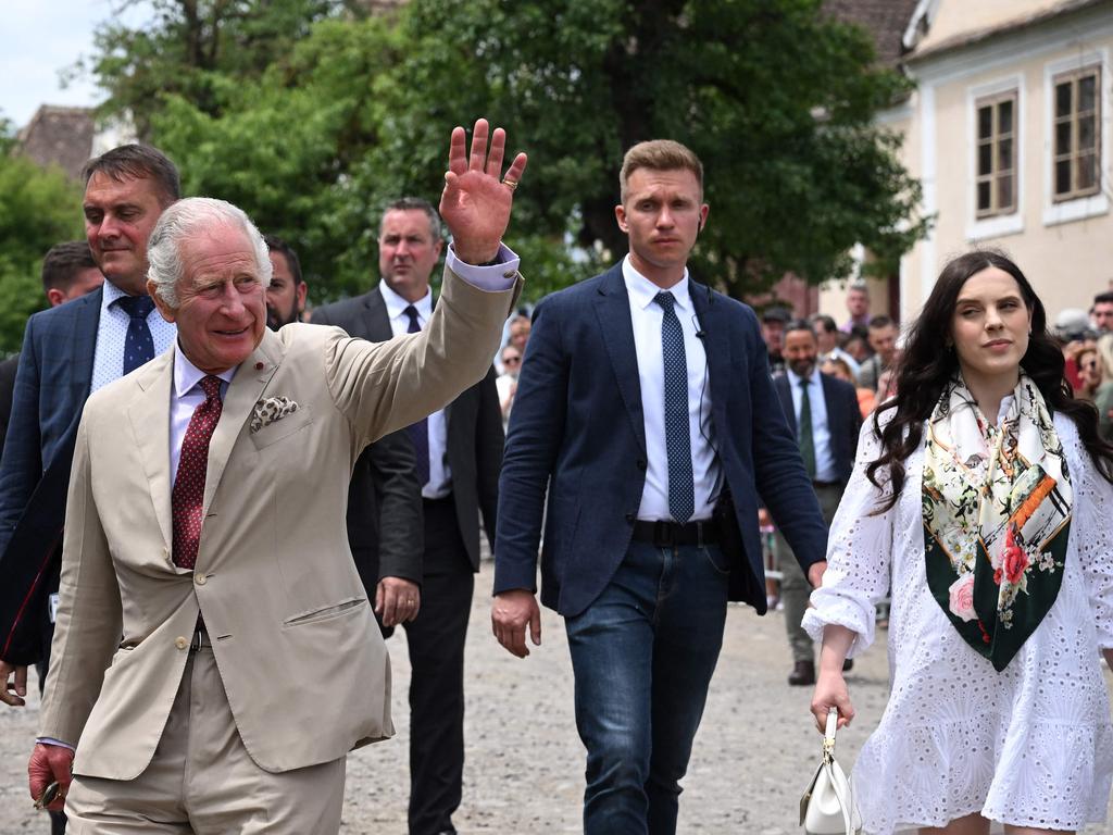 King Charles III waves to the crowd as he arrives to visit Viscri village, central Transylvania region, Romania. Picture: AFP