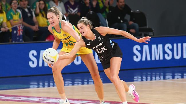 Jane Watson of the Silver Ferns looks to control the ball.