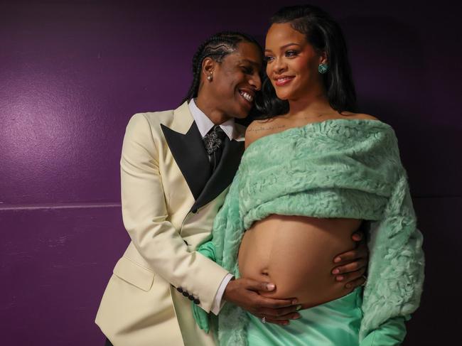 HOLLYWOOD, CA - MARCH 12: ASAP Rocky and Rihanna backstage at the 95th Academy Awards at the Dolby Theatre on March 12, 2023 in Hollywood, California. (Robert Gauthier / Los Angeles Times via Getty Images)