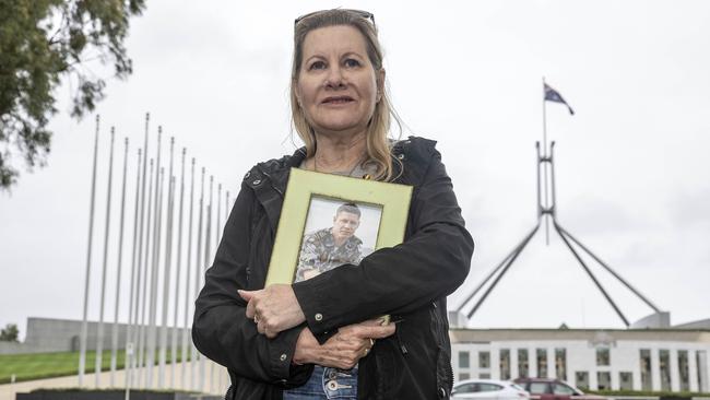 The mother of Dave Finney, Julie-Ann Finney. Australian veterans gather outside Parliament House in Canberra to petition for a royal commission into suicides among veterans and defence personnel. Picture: NCA NewsWire / Gary Ramage