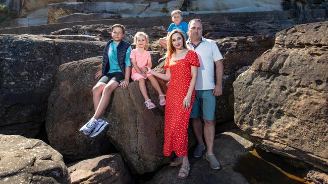 Angelina and Andrii Samko with their kids Artem, Anton and Veronika. Picture: Julian Andrews