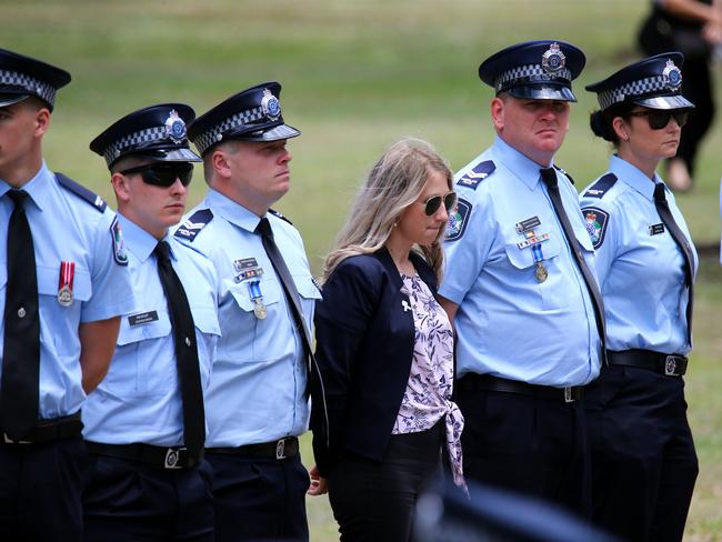 Mourners at the memorial service with full police honours for constables Rachel McCrow and Matthew Arnold at Brisbane Entertainment Centre. Picture: David Clark