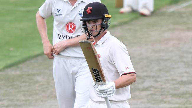 James Seymour of Essendon (right) reacts after reaching 50 runs bats during the Victorian Premier Cricket match between Essendon and Geelong at Windy Hill in Essendon, Saturday, February 1, 2020. (Photo/Julian Smith)