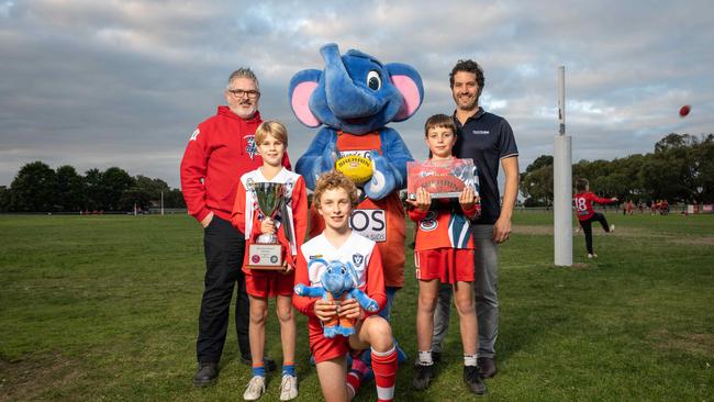 Ocean Grove Cobras president Aaron White, mascot Heath Levis and Karl Waddell with players Eamonn Lake, William Green and Billy Heenan. Picture: Brad Fleet