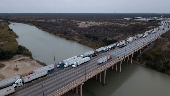 Trucks in line to enter the United States at the U.S.-Mexico border in Laredo, Texas. Picture: Cheney Orr/Bloomberg News