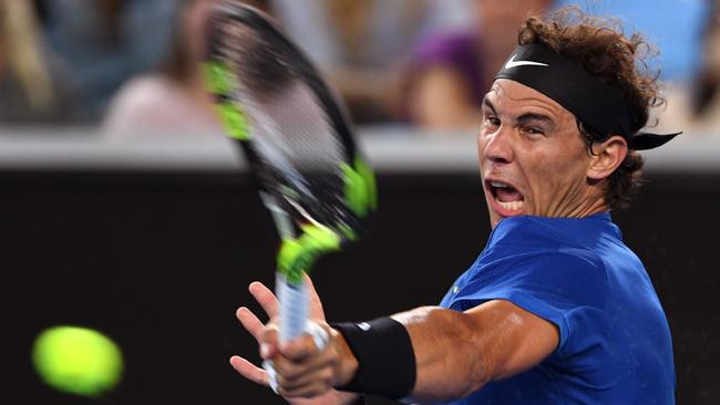 Rafael Nadal hits a trademark forehand during the Tie Break Tens. Photo: William West