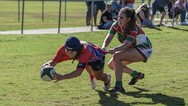 Evie Sampson scoring for the GCDRU Barbarians last year. Picture: Blue Wave Sky