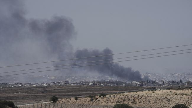 Smoke from Israeli strikes rises over the northern Gaza Strip, seen from the Israel-Gaza border, Southern Israel, Friday, May 16, 2025. (AP Photo/Maya Alleruzzo)