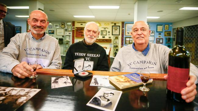 Veterans' Affairs minister Guy Barnett, ex-Navy serviceman Jack Bird and Edward 'Teddy' Sheean's nephew Garry Ivory celebrate Teddy being awarded a posthumous Victoria Cross at the Launceston RSL. Picture: PATRICK GEE