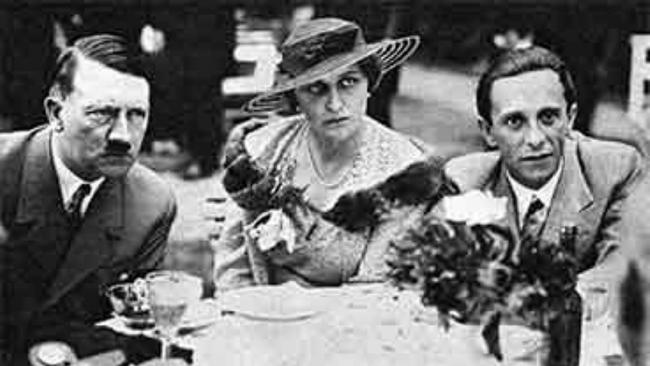 Magda Goebbels at dinner with Adolf Hitler and her husband Joseph Goebbels.