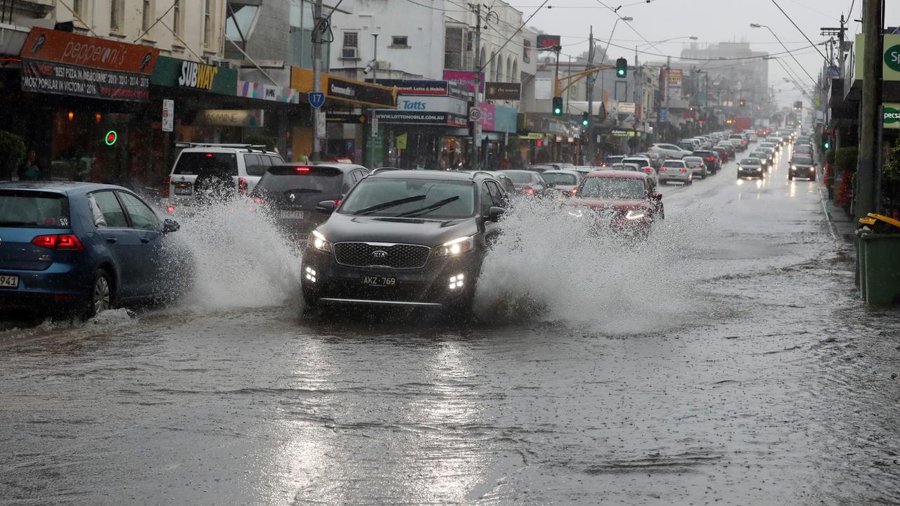 Flash flooding in Camberwell Junction after another heavy downpour. Picture: Alex Coppel 