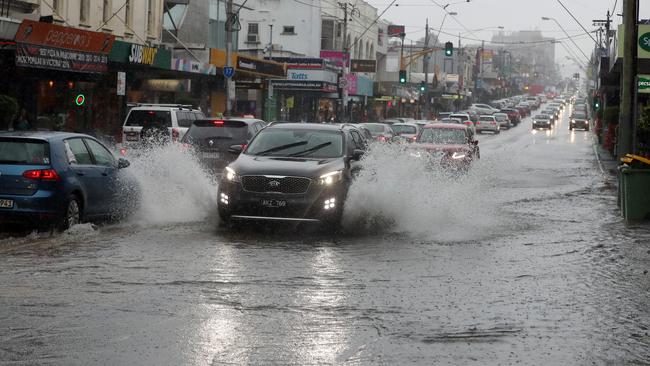 Flash flooding in Camberwell Junction after another heavy downpour. Picture: Alex Coppel 