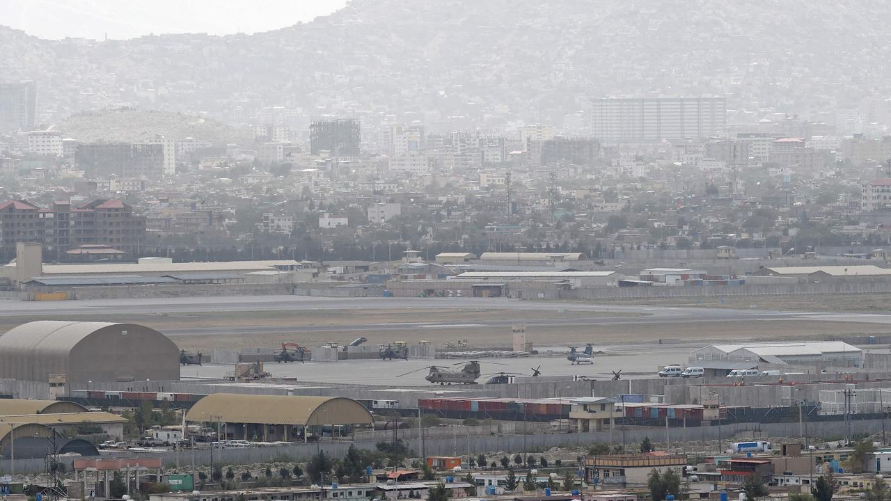 Military helicopters standing on the tarmac on August 14. Picture: Wakil Kohsar/AFP