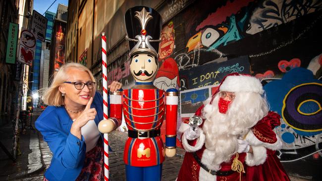 Melbourne Christmas Festival 2020 Program Launch at Hosier Lane, Melbourne. Lord Mayor Sally Capp catches up with Santa during the launch. Picture: Tony Gough