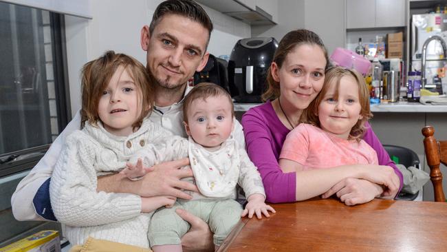 Matthew King and Shae Pettigrew and their children Allyra, George and baby Leonardo at their Seaford Heights home. Picture: Brenton Edwards