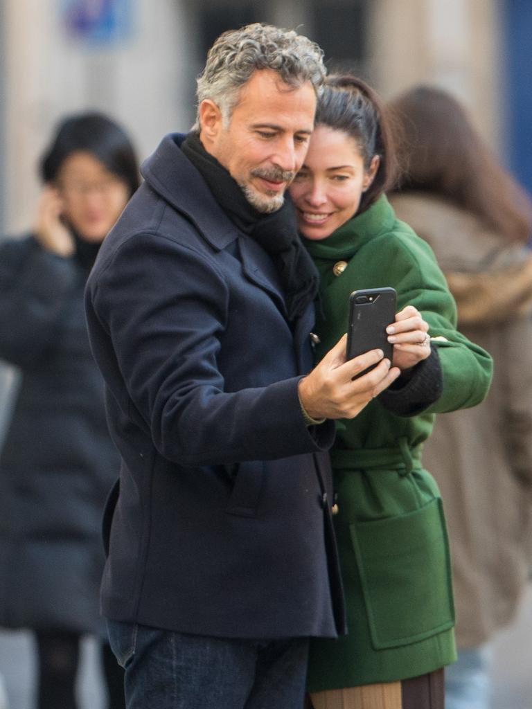 Love birds Erica Packer and Enrique Martinez walk in the streets of Paris. Picture: Backgrid