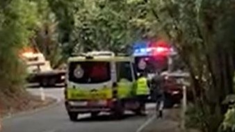 Emergency crews attend a single-vehicle rollover at Currumbin Valley. Picture: Whaia Whaea