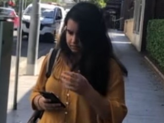 Kanishka Chaudhari, 24, of North Sydney, outside Manly Local Court on Thursday, February 22, 2024, where she is facing 14 counts of dishonestly obtain property by deception for allegedly taking money from Camperdown Cellars.