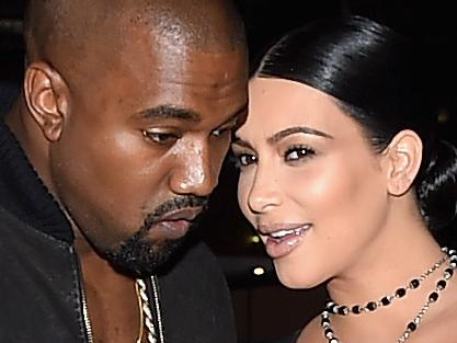 NEW YORK, NY - SEPTEMBER 11: Rapper Kanye West (L) and television personality Kim Kardashian attend the Givenchy fashion show during Spring 2016 New York Fashion Week at Pier 26 at Hudson River Park on September 11, 2015 in New York City. (Photo by Michael Loccisano/Getty Images)