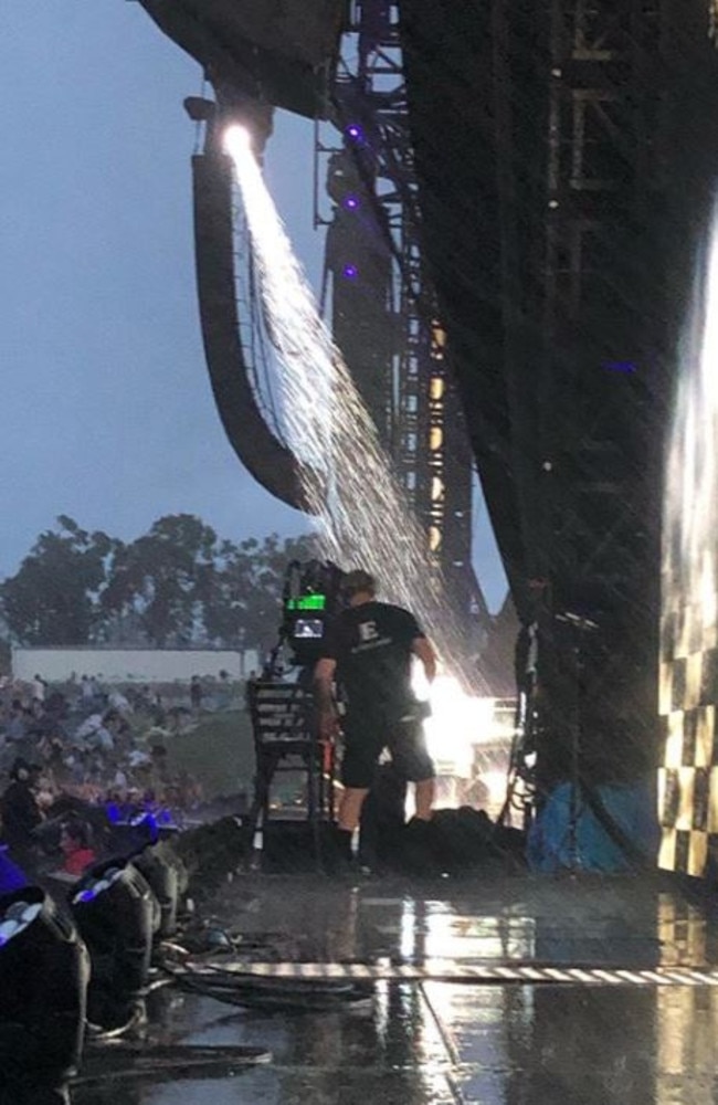 Ms Ellis took this photo at the concert, showing rain lashing the stage. Picture: Instagram/Susan Ellis