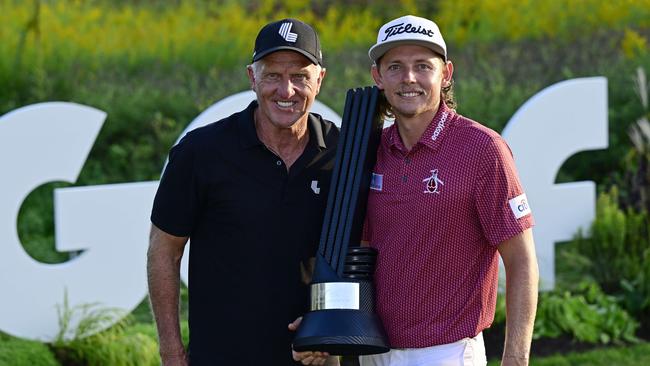 SUGAR GROVE, ILLINOIS - SEPTEMBER 18: Team Captain Cameron Smith of Punch GC poses with Greg Norman, CEO and commissioner of LIV Golf, after winning the individual title during Day Three of the LIV Golf Invitational - Chicago at Rich Harvest Farms on September 18, 2022 in Sugar Grove, Illinois. Quinn Harris/Getty Images/AFP