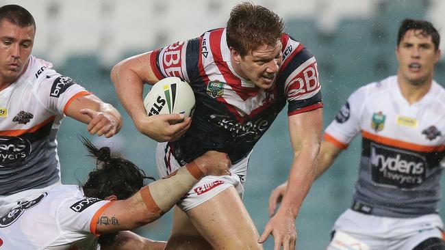 Dylan Napa has been charged for a careless high tackle on Wests Tigers fullback James Tedesco. Picture: Brett Costello