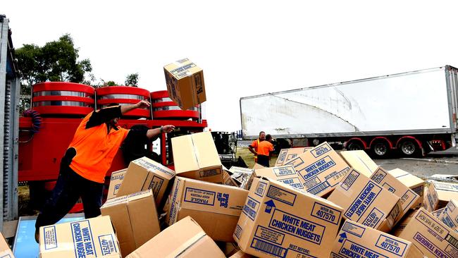 Hundreds of boxes of chicken nuggets and fish fillets thrown out because of a truck smash in Melbourne. Picture: Nicole Garmston