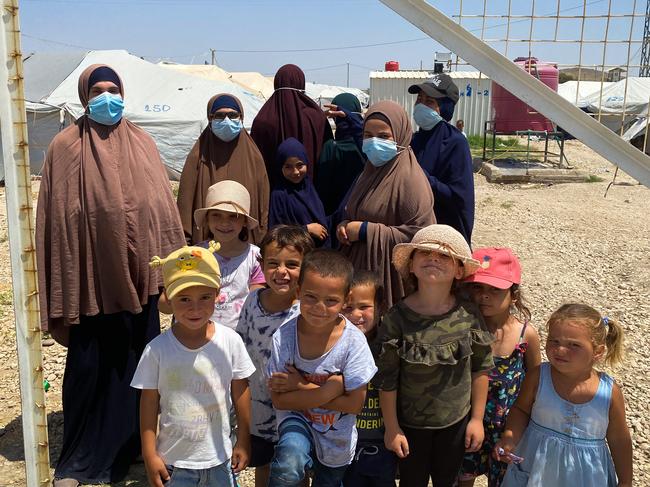 Australian women Mariam Dabboussy, Aminah Assaad, Nesrine Zahab, Shayma Assaad and Bessima Assaad with their children at the at al-Roj camp in northeastern Syria. Picture: The Australian