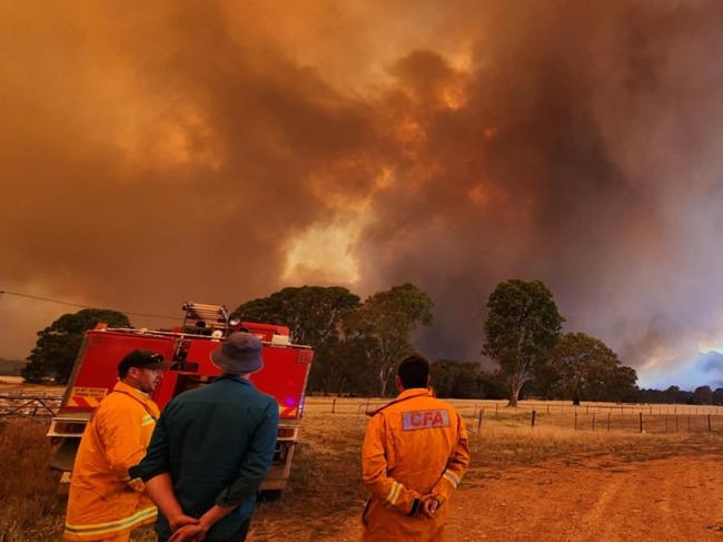 21/12/2024 North Hamilton Rural Fire Brigade members watch over a bushfire in the Grampians: Picture North Hamilton Rural Fire Brigade/Facebook, ,