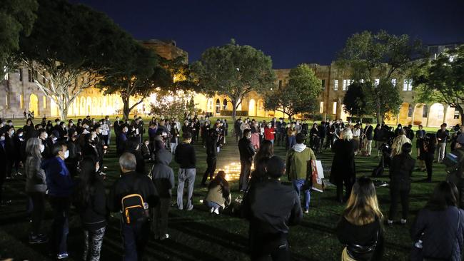 More than 200 gather at University of Queensland’s Great Court to hold a vigil in memory of the Tiananmen Square massacre. Picture: Josh Woning