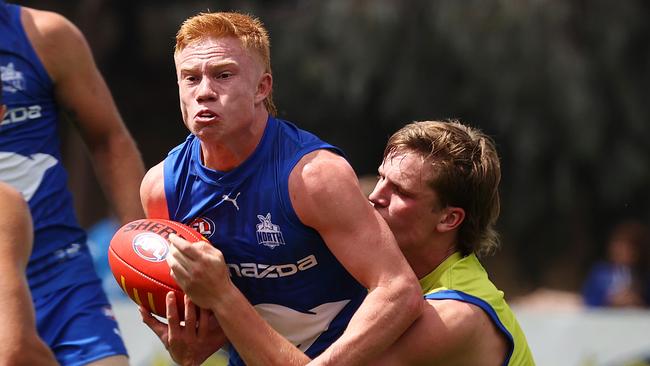 Blake Drury tries to break clear in a pre-season intraclub game. Picture: Michael Klein