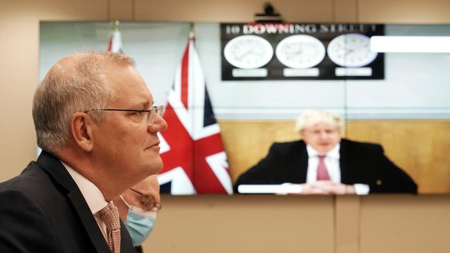 Prime Minister Scott Morrison holds a virtual tele conference with UK Prime Minster Boris Johnson at Parliament House. Picture: NCA NewsWire