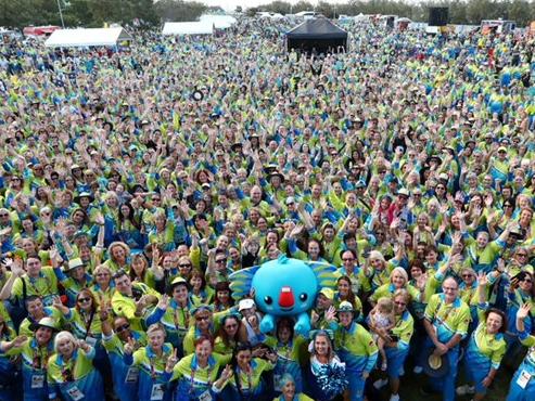 Thousands of volunteers pose with Borobi during the Thank The Volunteers night for Games Shapers in Southport.