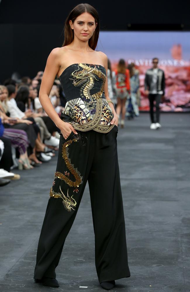 Jesinta in an Asian motif bodice top with matching wide-legged trousers. Picture: Jonathan Ng