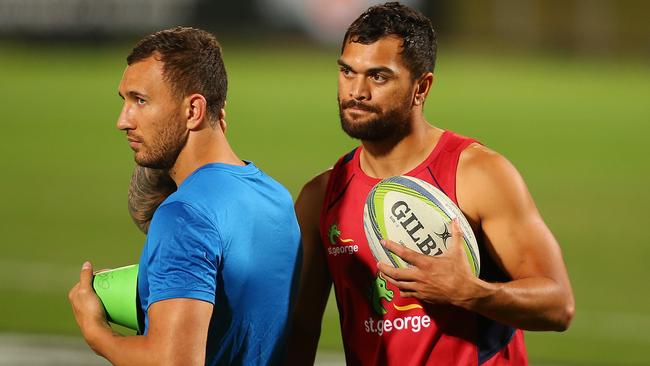 Quade Cooper and Karmichael Hunt during Reds training in 2014.