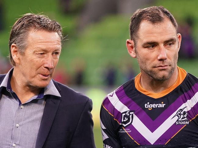 Craig Bellamy, coach of the Melbourne Storm and Cameron Smith talk during the Round 25 NRL match between the Melbourne Storm and the North Queensland Cowboys at AAMI Park in Melbourne, Friday, September 6, 2019. (AAP Image/Scott Barbour) NO ARCHIVING, EDITORIAL USE ONLY