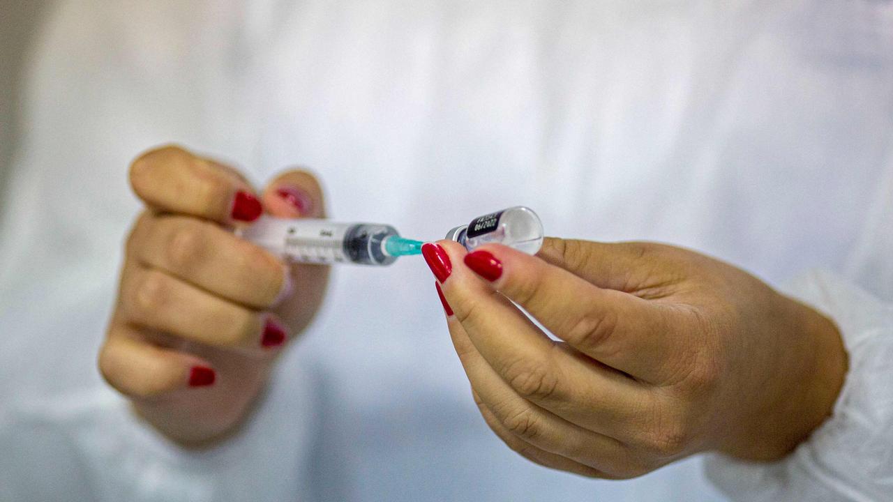 A 16-year-old boy who tested positive to “flurona” was vaccinated against both and experienced no symptoms. Picture: Daniel Ramalho / AFP