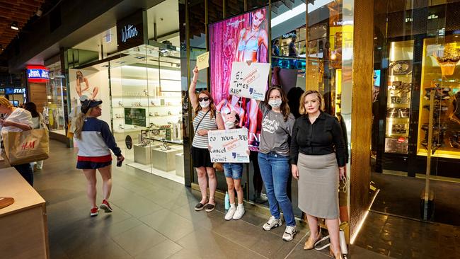 Parents and councillor Linda Scott (right) outside Honey Birdette in Broadway. Picture: Franca Turrin